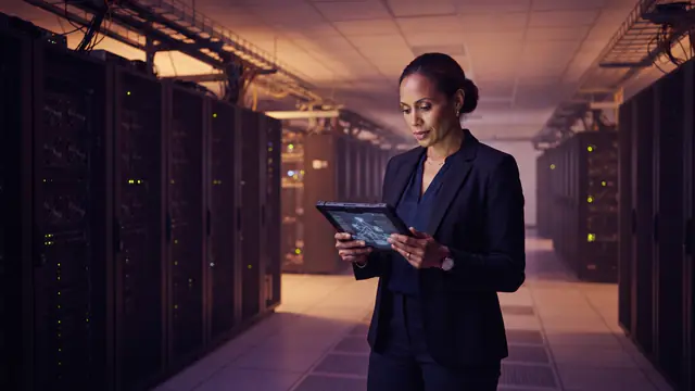 An expansive data center corridor filled with enterprise server racks.